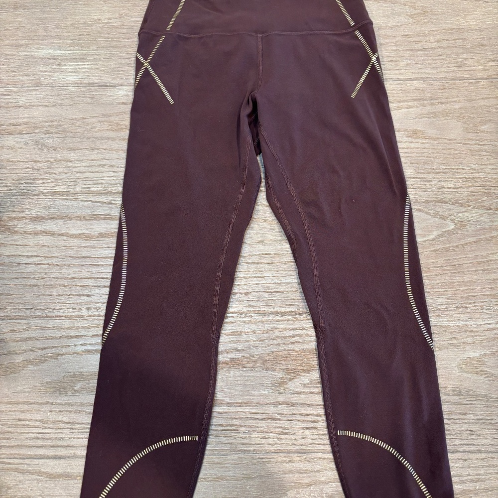 LULULEMON LEGGINGS SIZE 8 MAROON GOLD